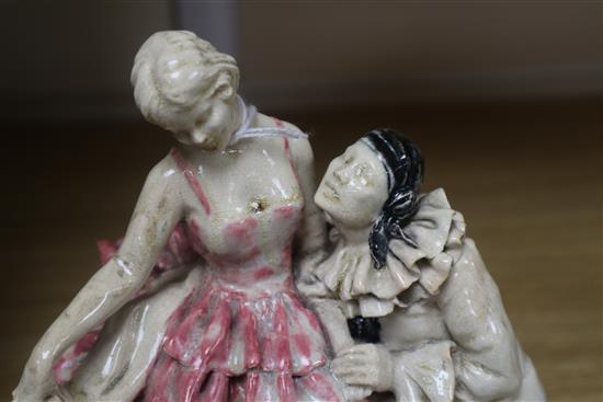 A 1920s/30s art pottery group of Pierrot and Columbine, indistinctly signed to the base, height 19cm